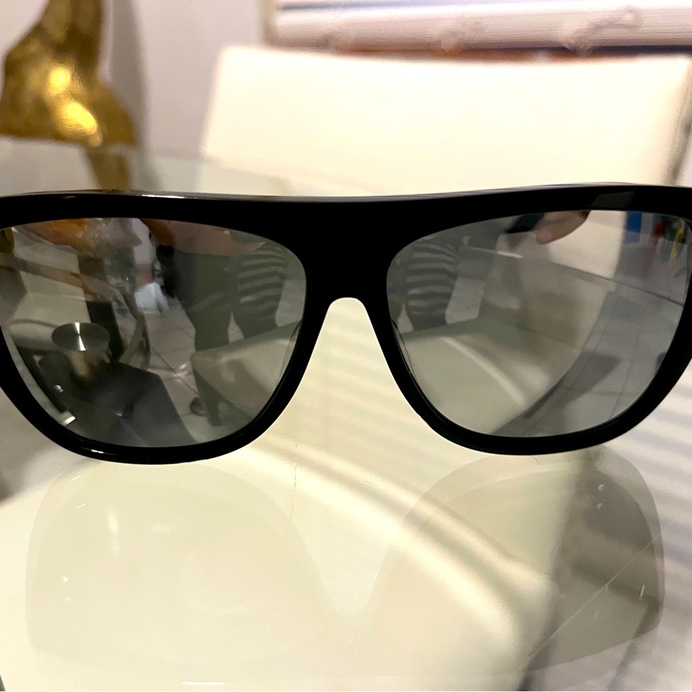 These are Saint Laurent Mirror Flat Top Sunglasses.